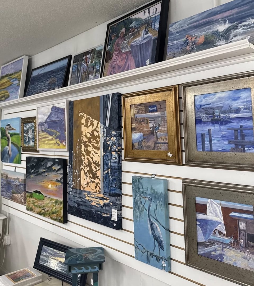 Gallery wall of coastal oil paintings: herons, harbors and marsh scenes